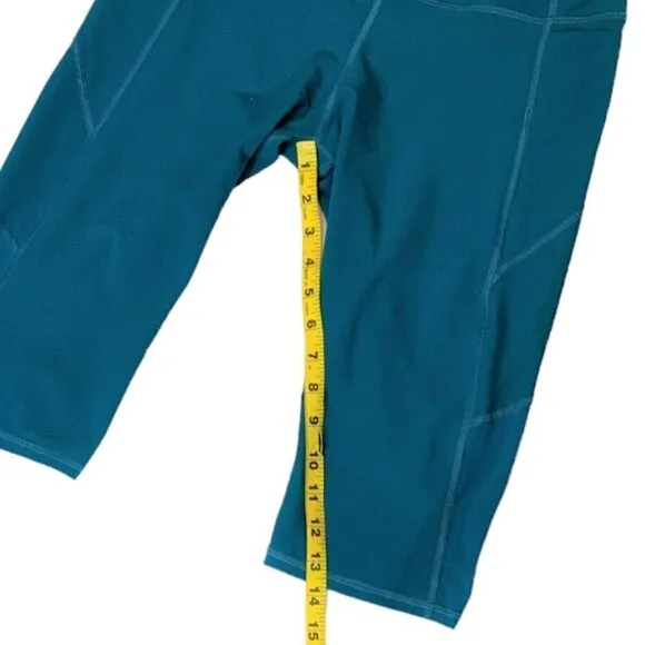 Athleta Cropped Mesh Insert Pocket Leggings Size MP Teal