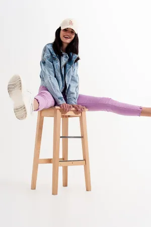 Distressed raw hem skinny jeans in lilac
