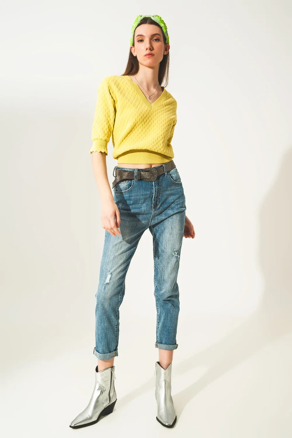 Distressed straight leg jean in light blue
