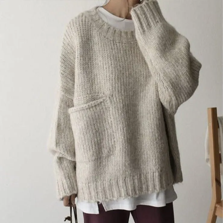 FallStil - Oversize Pullover mit elfenbeinfarbener Taschenfront