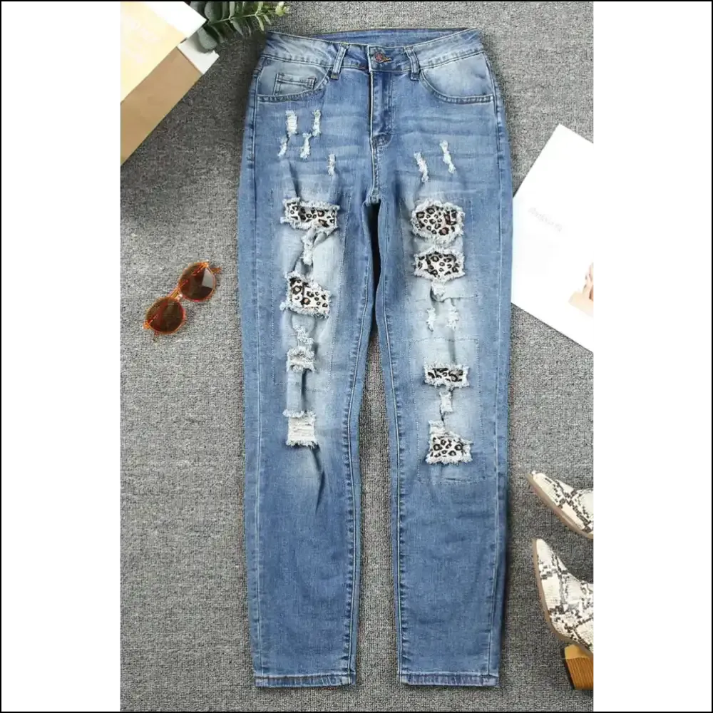 Flaunt your Inner Wild Child in Leopard Distressed Pocketed Jeans 🐆💥