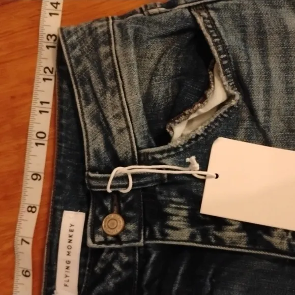 Flying Monkey NWT black lable jeans, size 25. Great fit and style. Distressed.