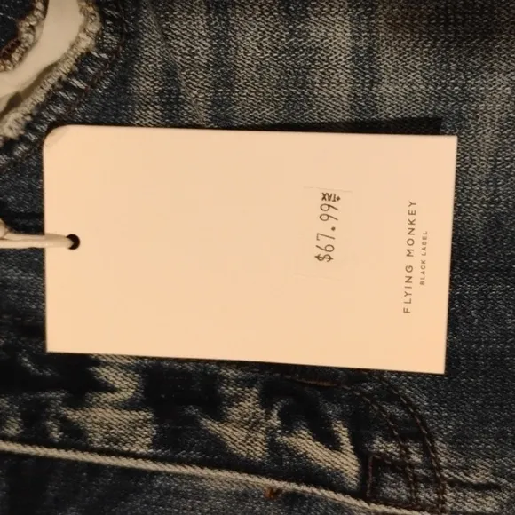 Flying Monkey NWT black lable jeans, size 25. Great fit and style. Distressed.