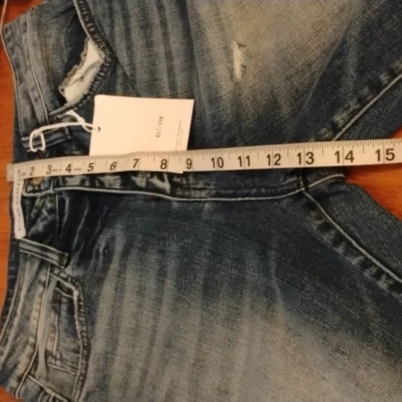 Flying Monkey NWT black lable jeans, size 25. Great fit and style. Distressed.
