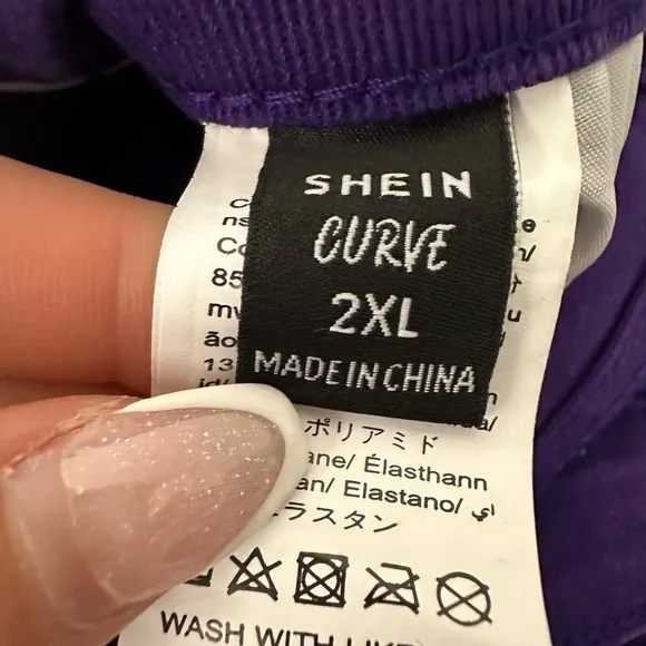Nwot- Shein Distressed High Waist Jeans in a vibrant purple.